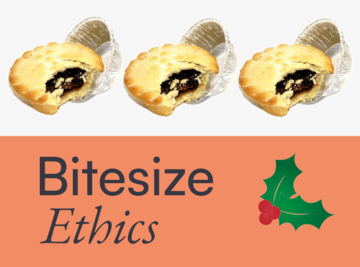 orange and white background with half eaten mincepie